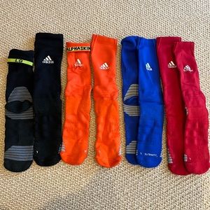 4 pair Adidas tennis crew socks.  New without tags. Size L Black orange blue red